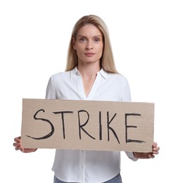 Woman holding cardboard banner with word Strike on white background