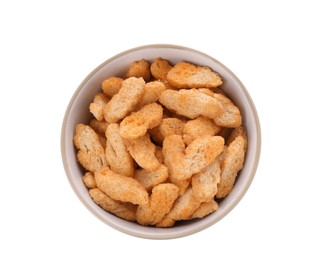 Photo of Delicious crispy rusks in bowl on white background, top view