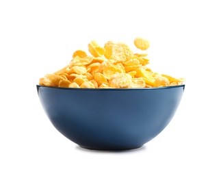 Photo of Crispy cornflakes falling into bowl on white background
