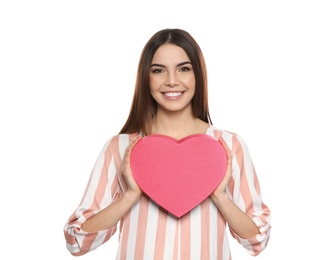 Portrait of beautiful smiling girl with heart shaped gift box on white background. International Women's Day