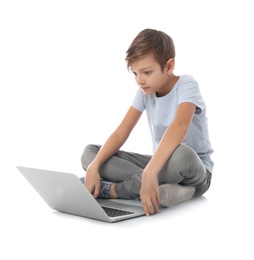 Shocked child with laptop on white background. Danger of internet