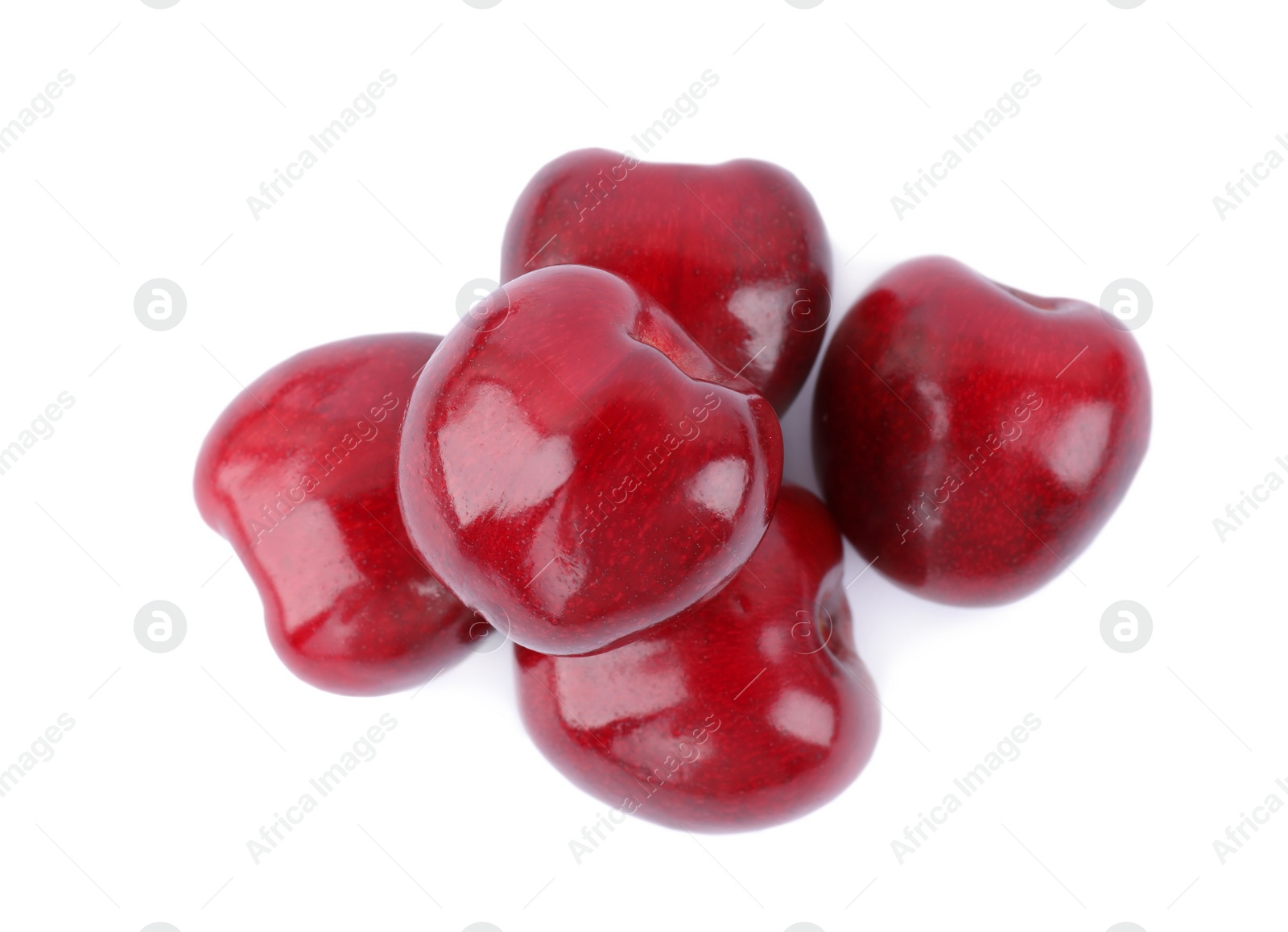 Photo of Tasty ripe red cherries isolated on white, top view