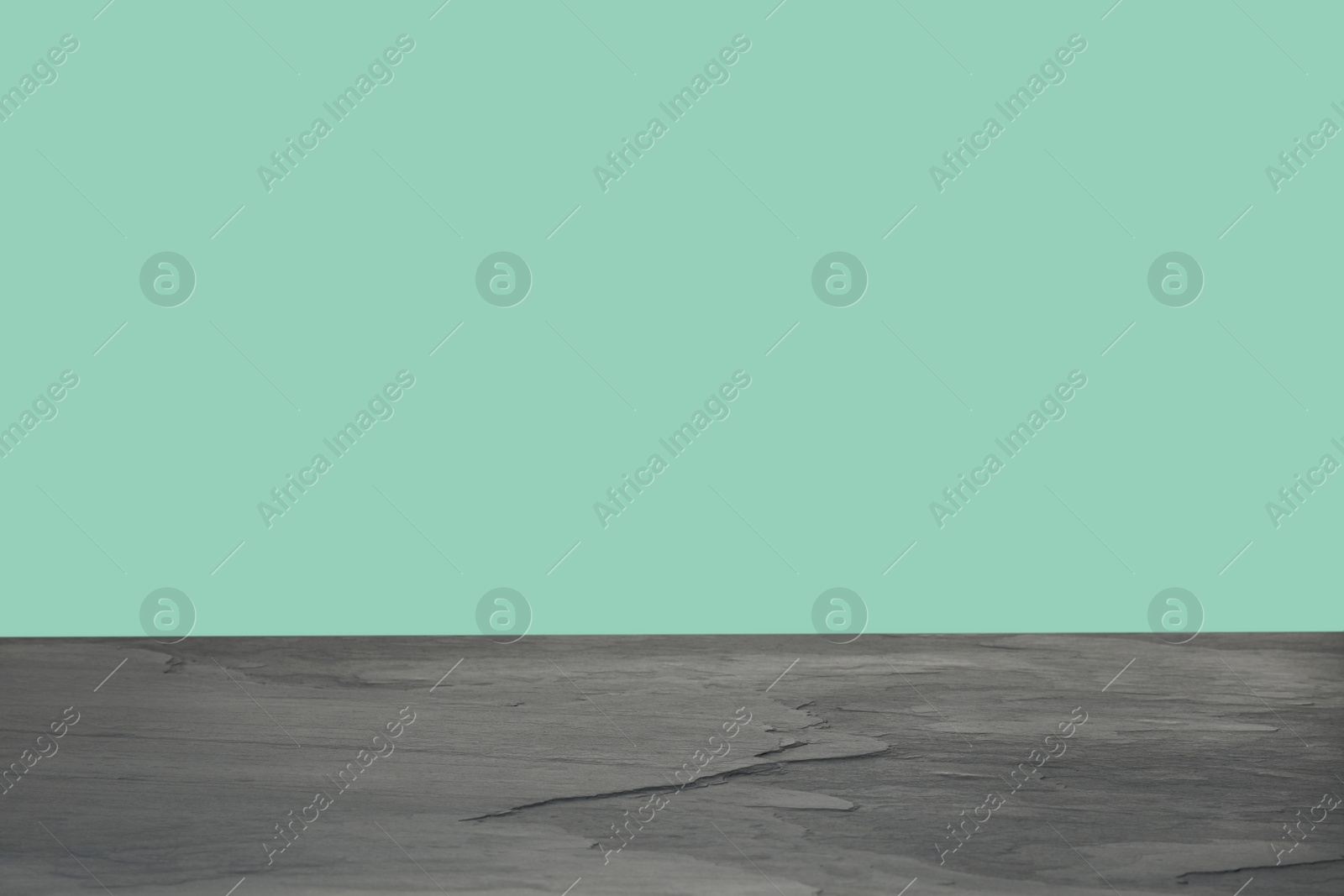 Image of Empty stone surface on mint background. Mockup for design