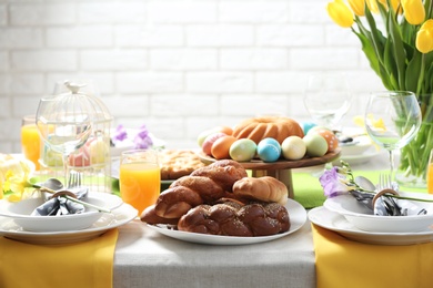 Festive Easter table setting with traditional meal at home