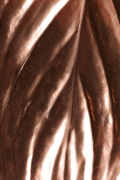 Closeup view of rose gold leaf as background