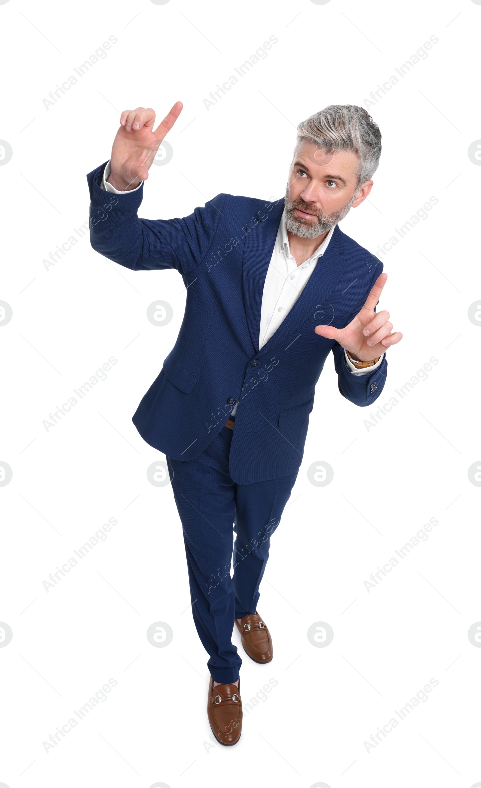 Photo of Mature businessman in stylish clothes posing on white background, above view