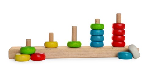 Photo of Stacking and counting game wooden pieces isolated on white. Educational toy for motor skills development