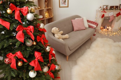 Beautiful Christmas tree in decorated living room