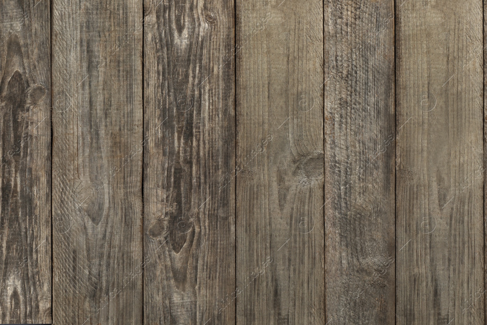 Photo of Texture of wooden board on black background, top view