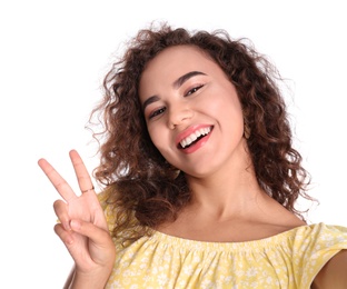 Photo of Portrait of beautiful laughing African-American woman on white background