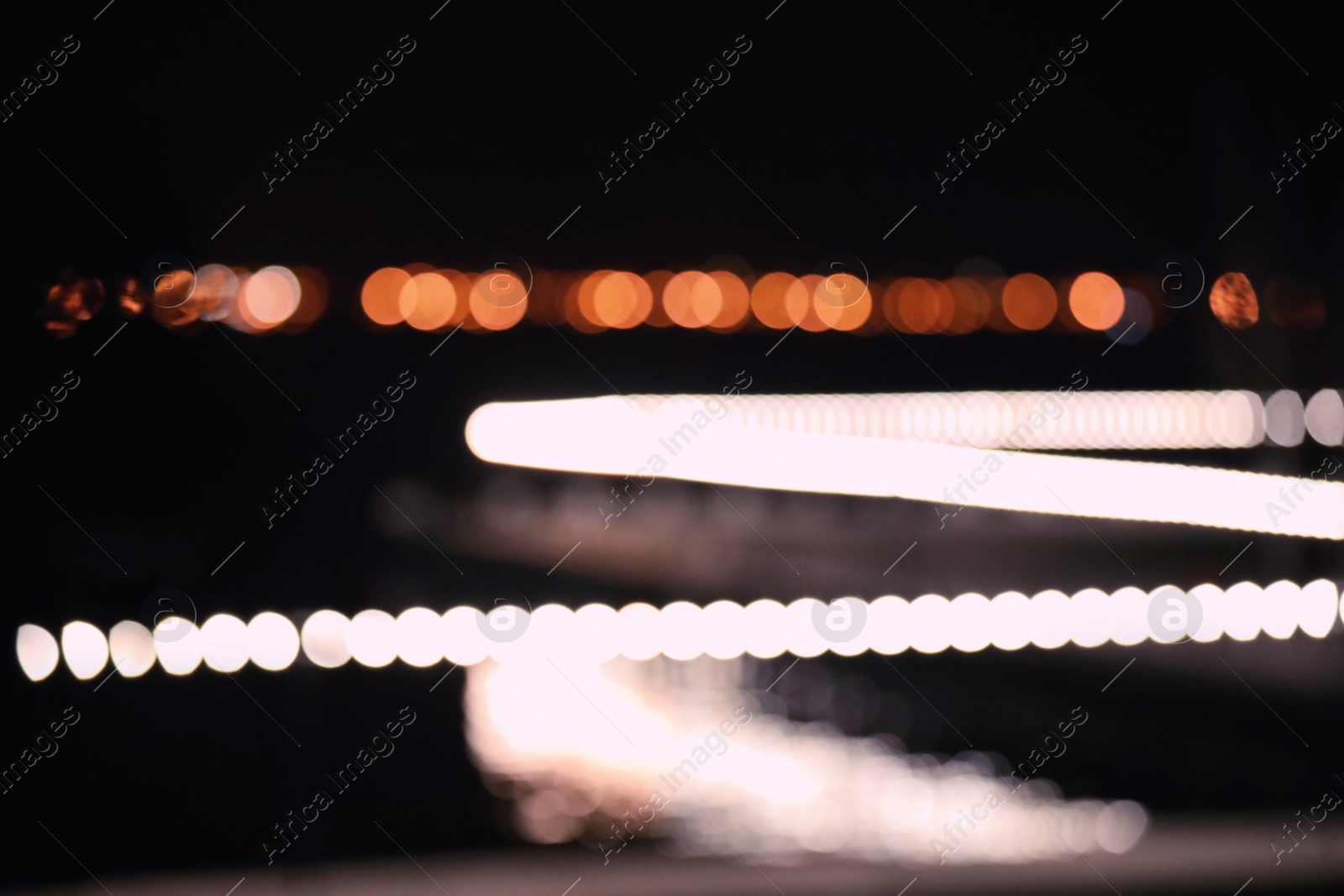 Photo of Blurred view of night city. Bokeh effect