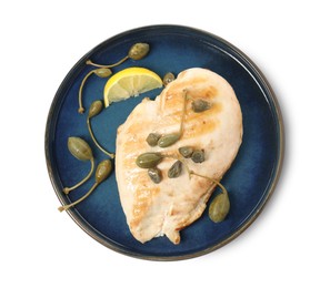 Photo of Delicious cooked chicken fillet with capers on white background, top view