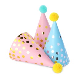 Three colorful party hats with pompoms isolated on white