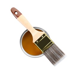 Photo of Can of yellow paint with brush isolated on white, top view