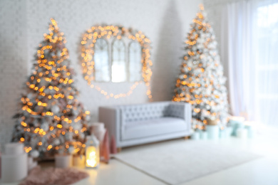 Photo of Blurred view of Christmas living room interior