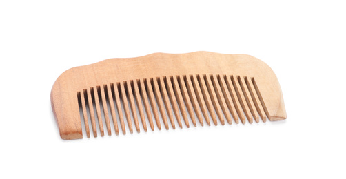 Photo of New wooden hair comb isolated on white