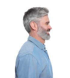 Photo of Mature businessman in stylish clothes posing on white background