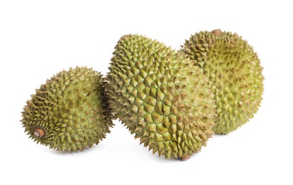 Photo of Whole ripe durian fruits on white background