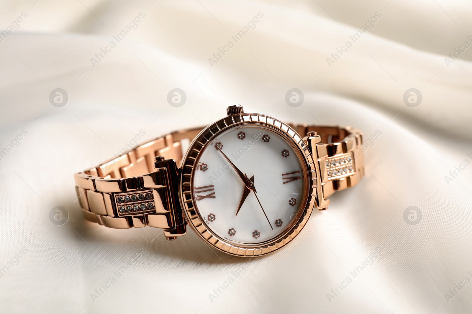 Photo of Luxury wrist watch on white background, closeup