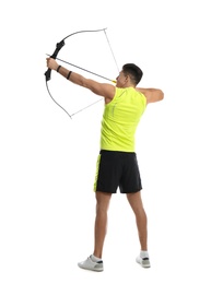 Man with bow and arrow practicing archery on white background