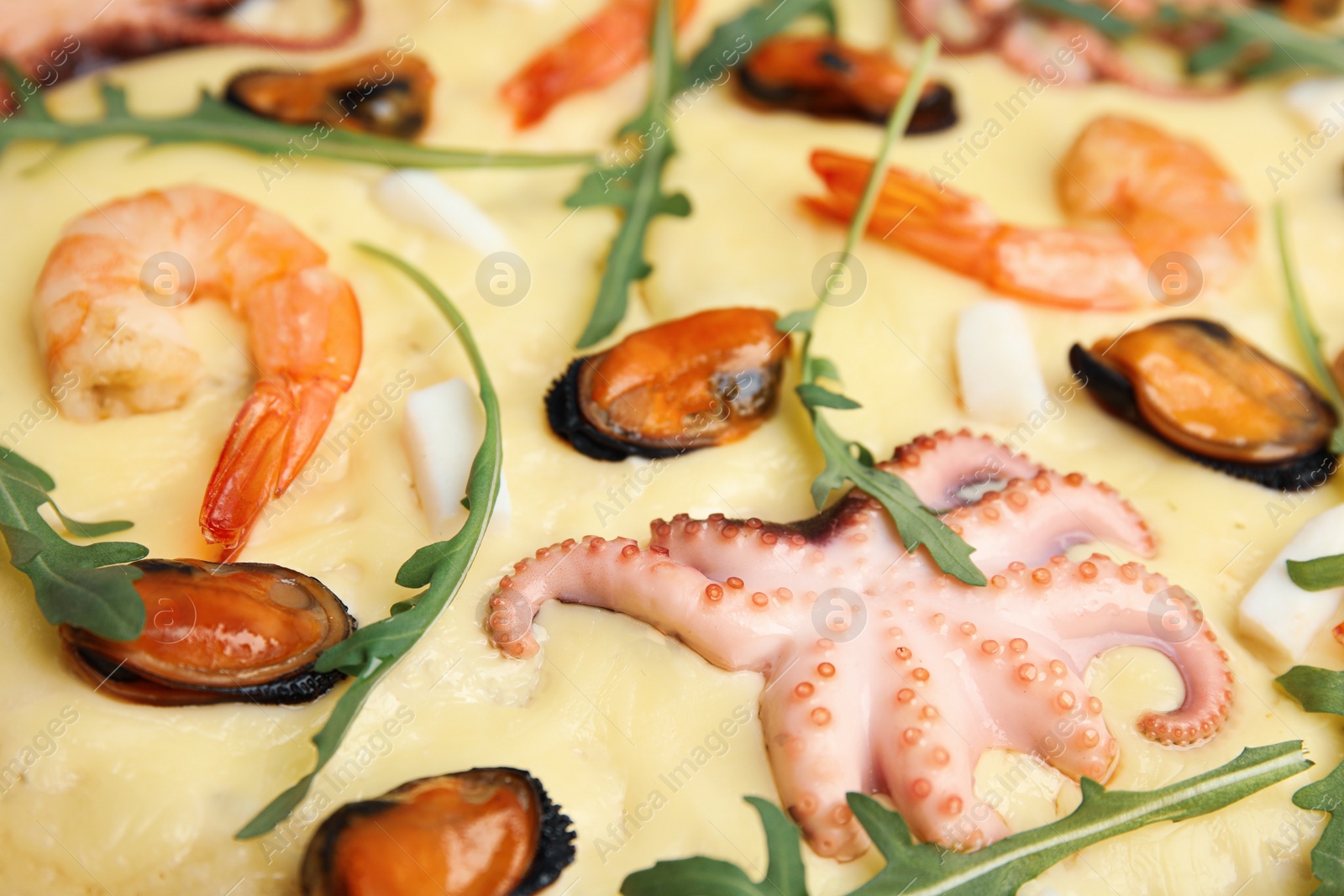 Photo of Delicious seafood pizza as background, closeup view
