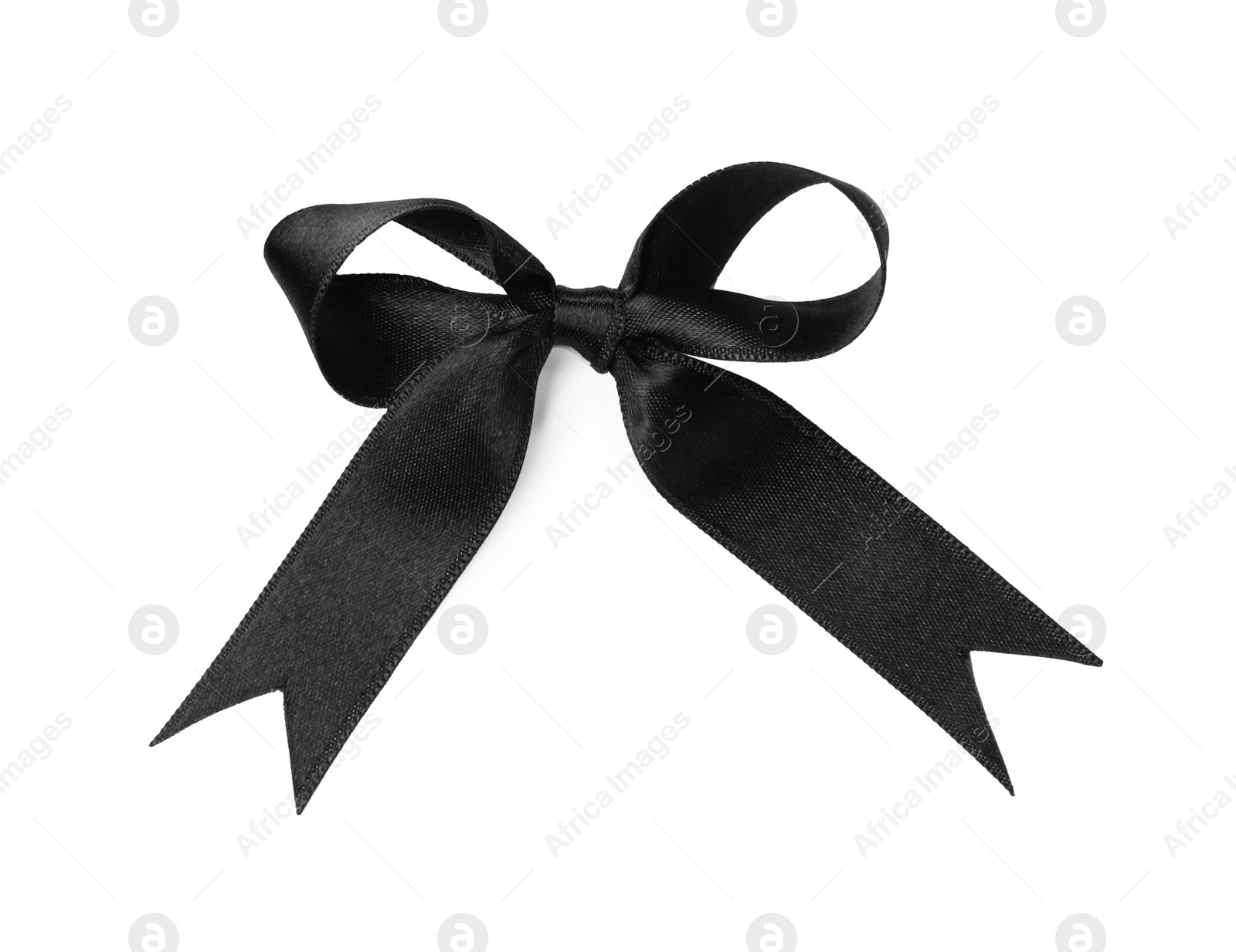 Photo of Black satin ribbon tied in bow on white background, top view