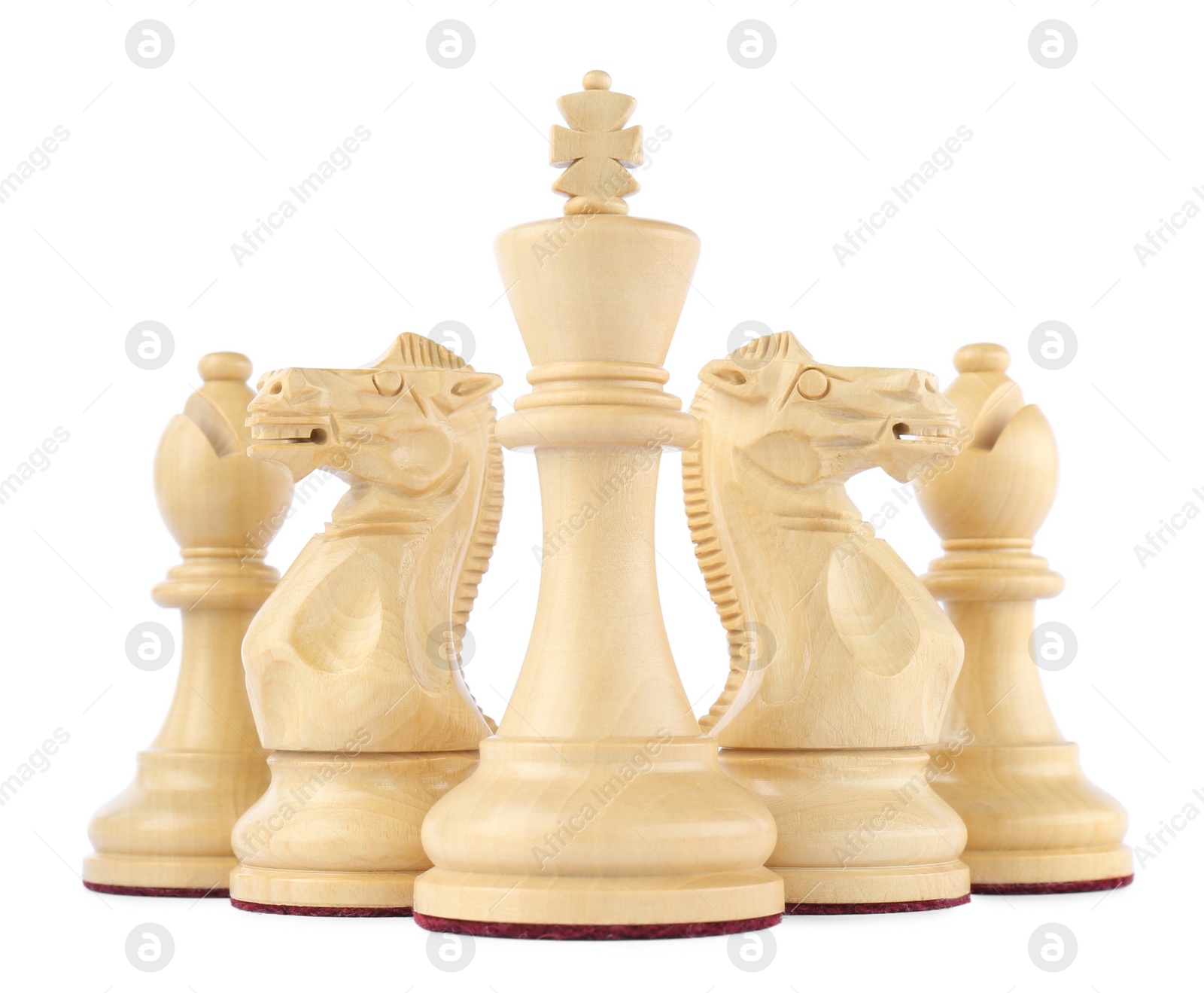 Photo of Set of wooden chess pieces on white background