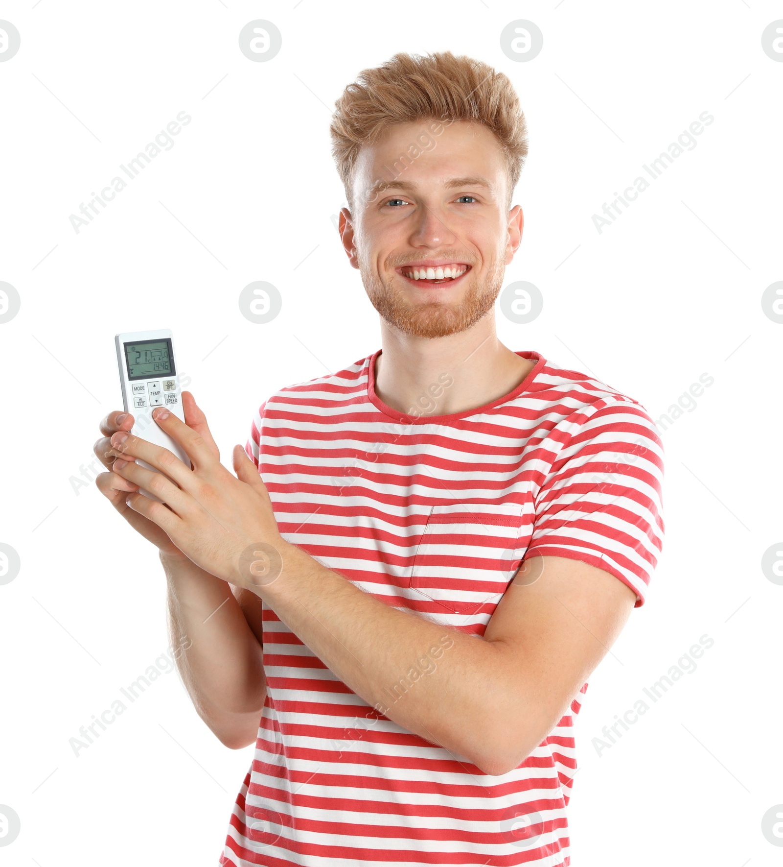 Photo of Young man with air conditioner remote on white background