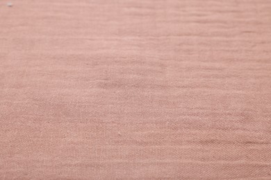 Photo of Texture of soft pastel fabric as background, closeup