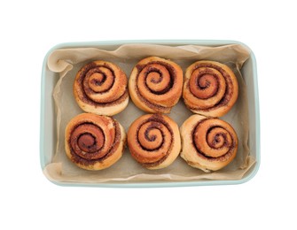 Photo of Baking dish with tasty cinnamon rolls isolated on white, top view