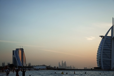 Photo of DUBAI, UNITED ARAB EMIRATES - NOVEMBER 03, 2018: Beautiful view of famous Burj Al Arab and sunset sky