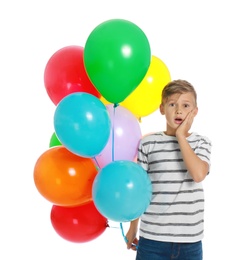 Photo of Emotional little boy holding bunch of colorful balloons on white background