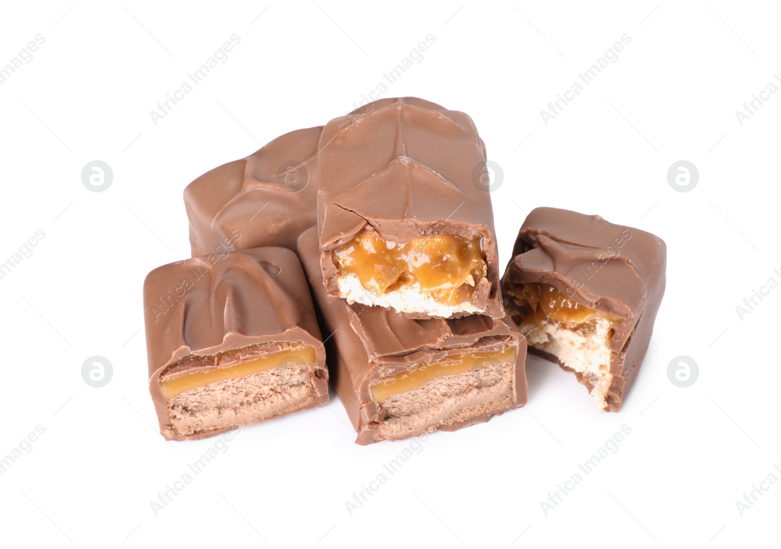 Photo of Pieces of tasty chocolate bars with nougat on white background