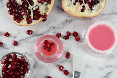 Photo of Flat lay composition with homemade cosmetic products and fresh pomegranate on white marble table. DIY beauty recipe