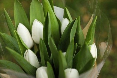 Beautiful bouquet of white tulips outdoors, closeup