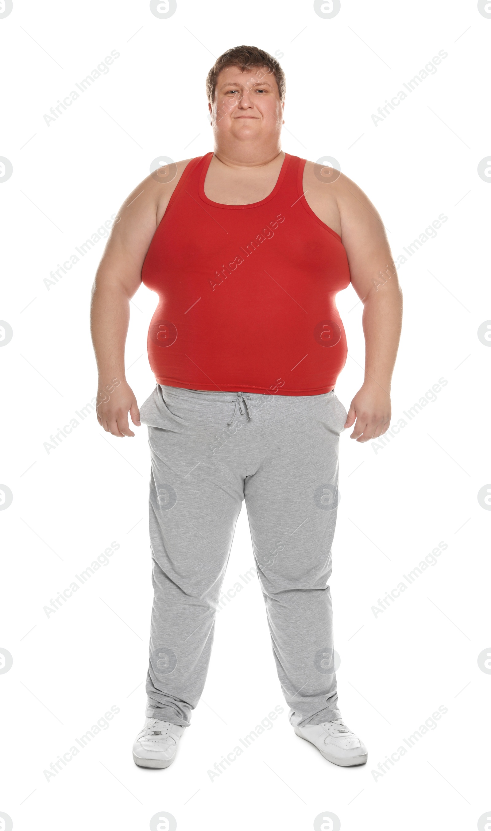 Photo of Full length portrait of overweight man on white background