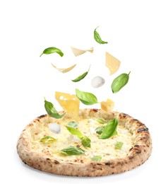 Image of Delicious pizza and flying ingredients on white background