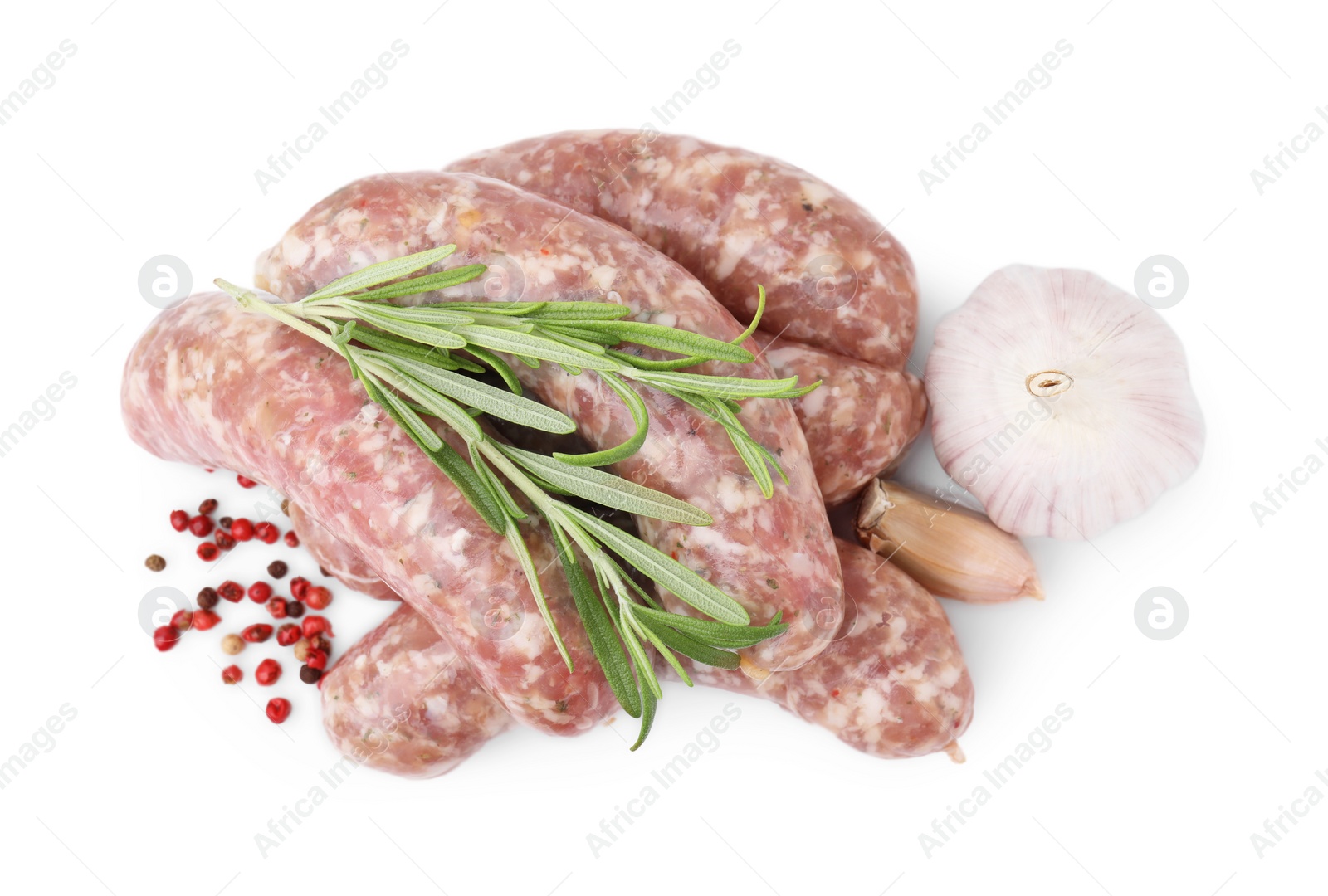 Photo of Raw homemade sausages and different spices isolated on white, top view