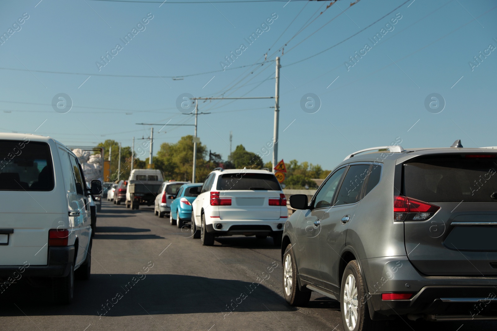 Photo of Modern cars in traffic jam on bridge