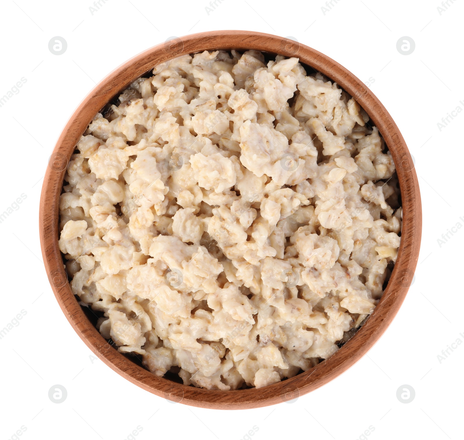 Photo of Tasty boiled oatmeal in bowl isolated on white, top view