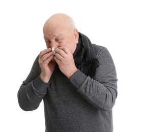 Photo of Senior man suffering from cold on white background