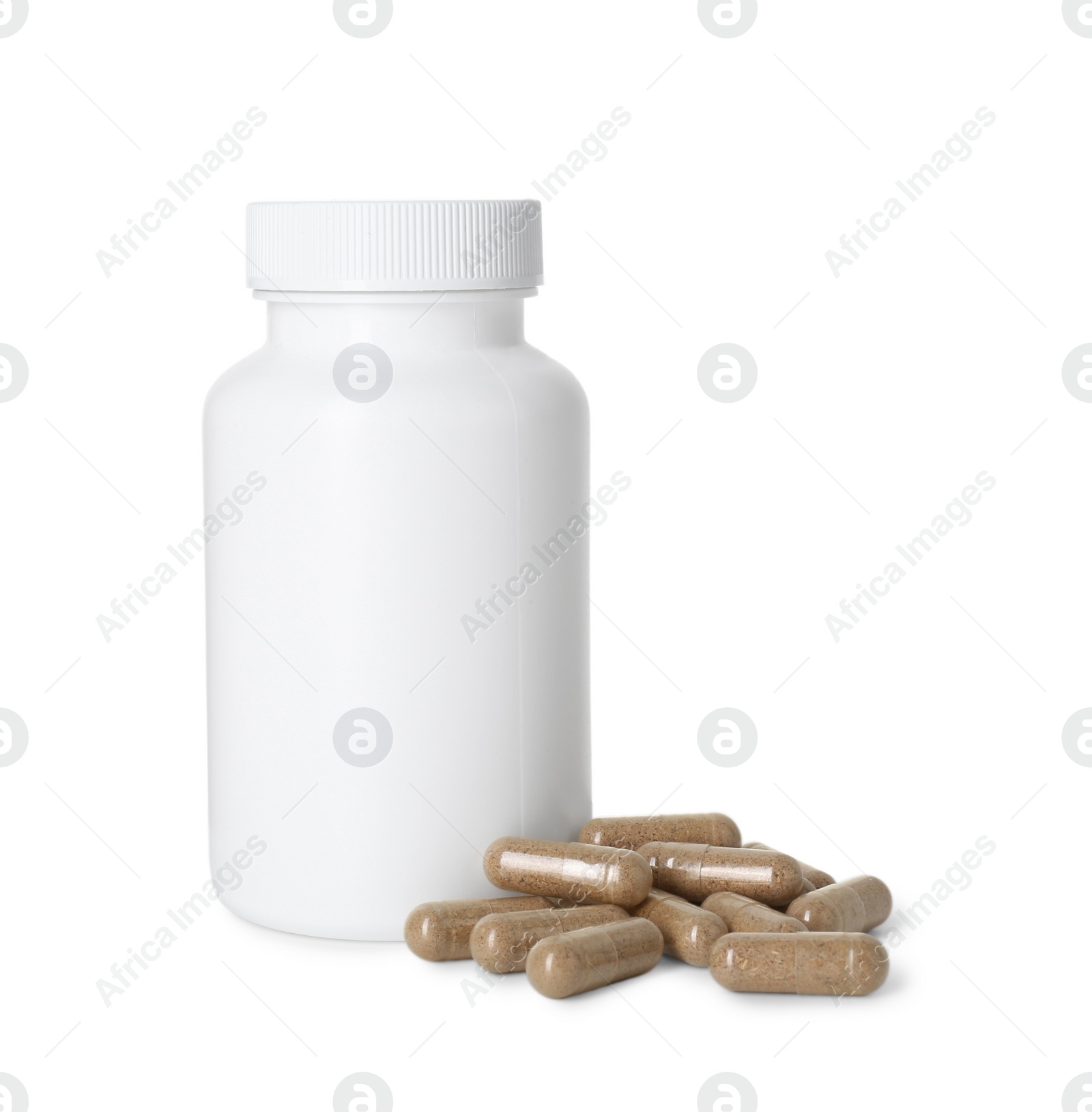 Photo of Bottle and pile of vitamin pills isolated on white