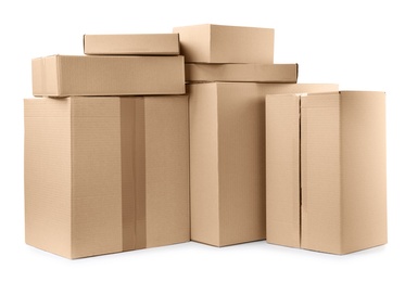 Photo of Pile of cardboard boxes on white background