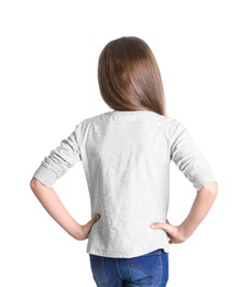 Photo of Little girl in long sleeve t-shirt on white background. Mockup for design