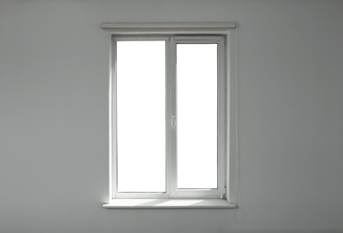 Photo of Light empty room with window. Home interior