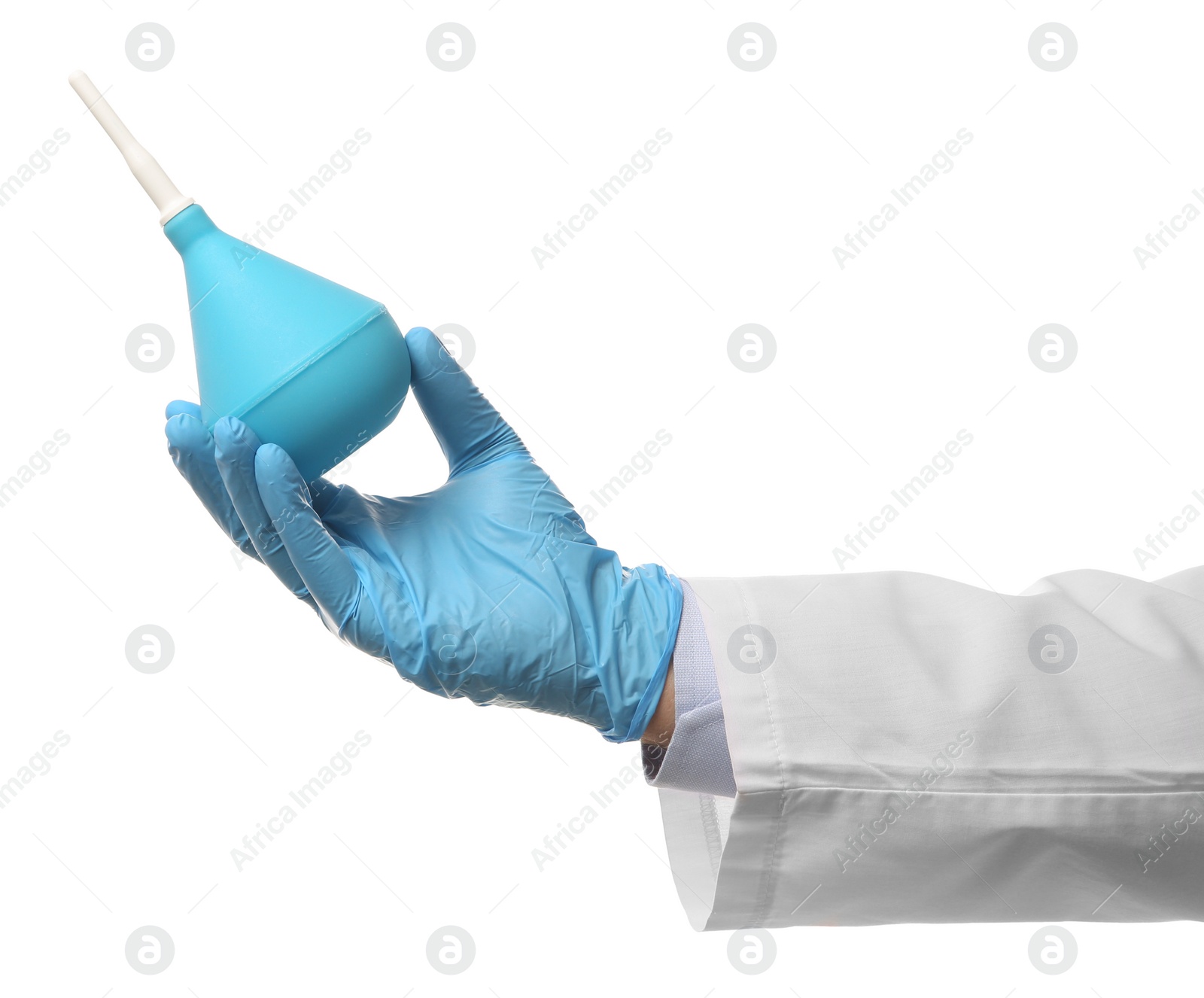 Photo of Doctor holding light blue enema on white background, closeup