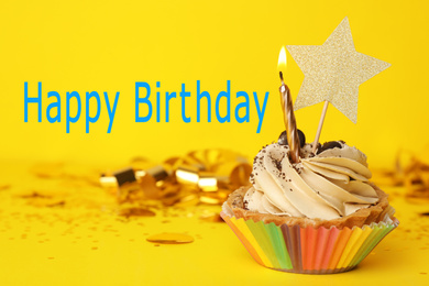 Birthday cupcake with candle and text Happy Birthday on yellow background