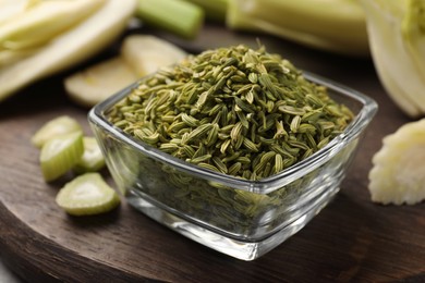 Photo of Fennel seeds in bowl on table, closeup