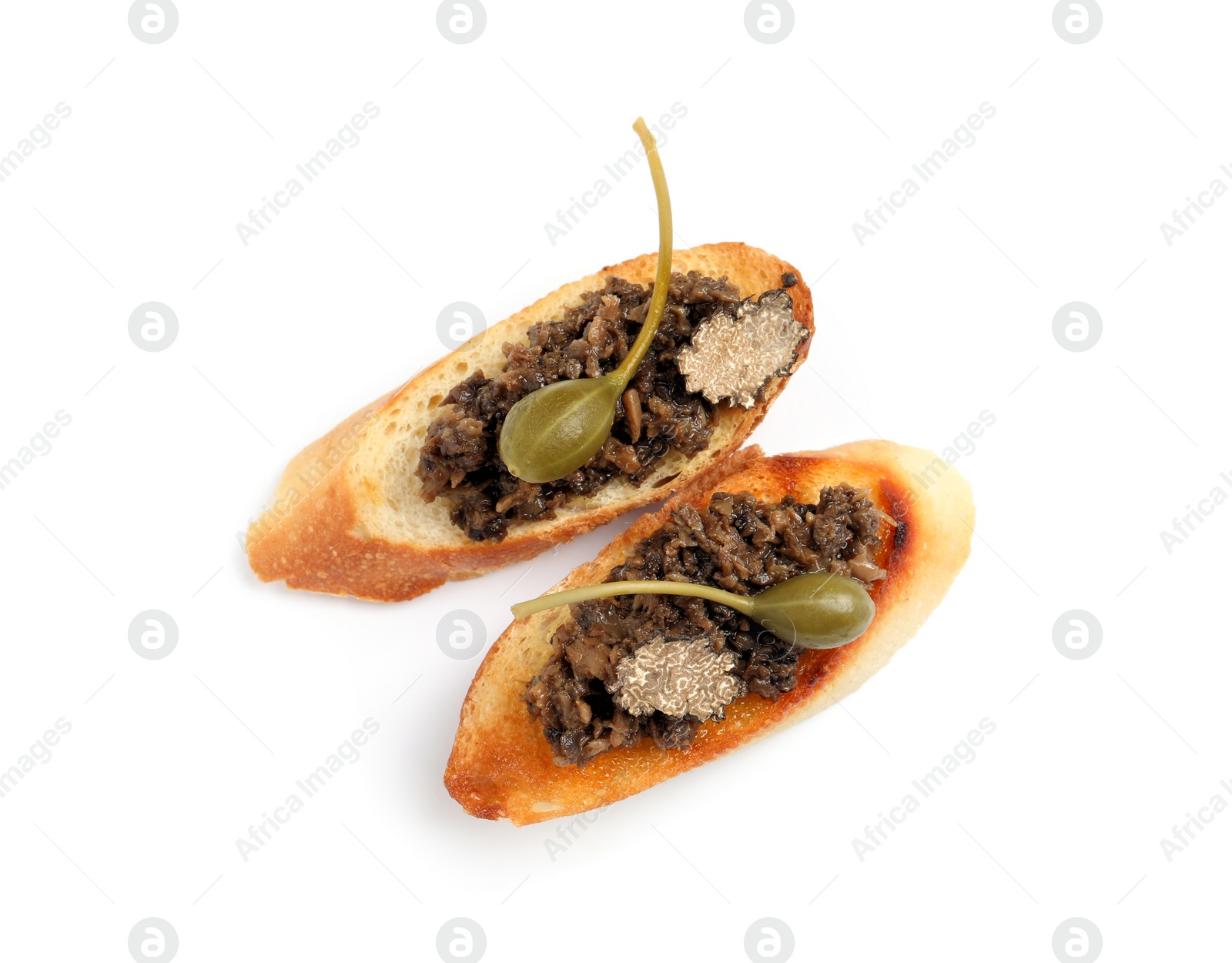 Photo of Tasty bruschettas with truffle paste and capers on white background, top view