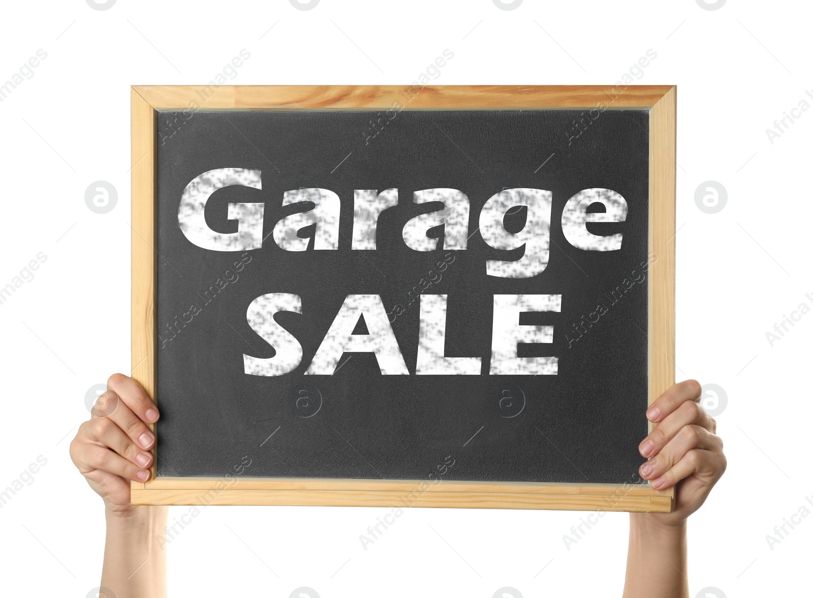 Image of Woman holding blackboard with phrase GARAGE SALE on white background, closeup